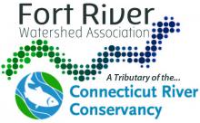 Grey text says "Fort River Watershed Association" with a pixelated river fading from green to blue. Under this it says "a tributary of the Connecticut River Conservancy" in blue text with a fish in a circle next to it.